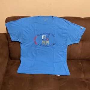 Champion. X-Large. Blue, gold, navy blue, red and white colors.